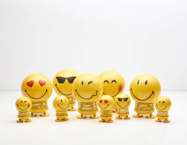 Hoptimist® Wackelfigur Smiley S gelb